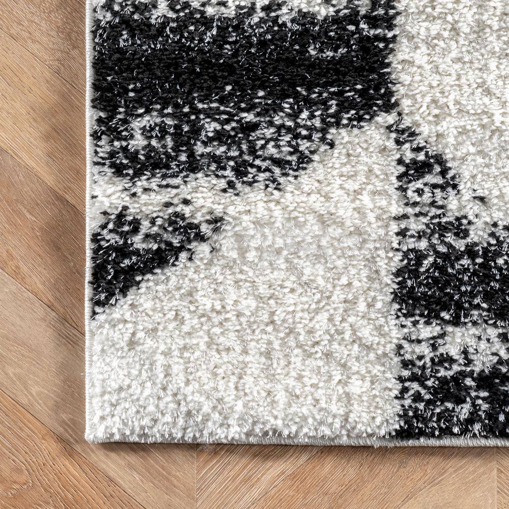 Elysian Herringbone 9' x 12' Black and White Shag Area Rug