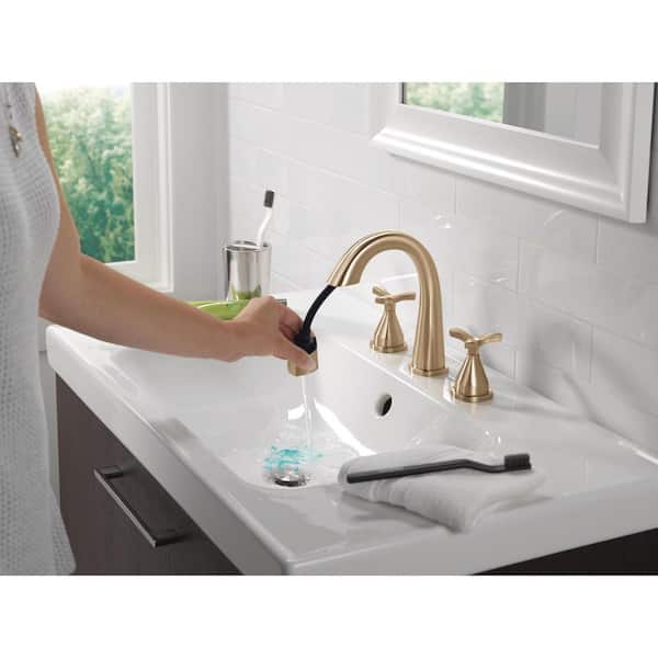 Stryke Gold 8 in. Widespread Double-Handle Bathroom Faucet with Pull-Down Spout in Lumicoat Champagne Bronze