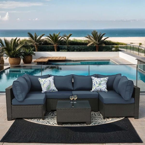 Zeus & Ruta Dark Coffee 7-Piece Wicker Outdoor Sectional Set with Dark Blue Cushions and Coffee Table