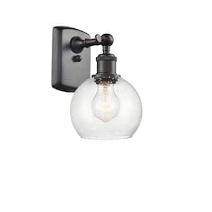 Athens 1-Light Oil Rubbed Bronze Wall Sconce with Seedy Glass Shade