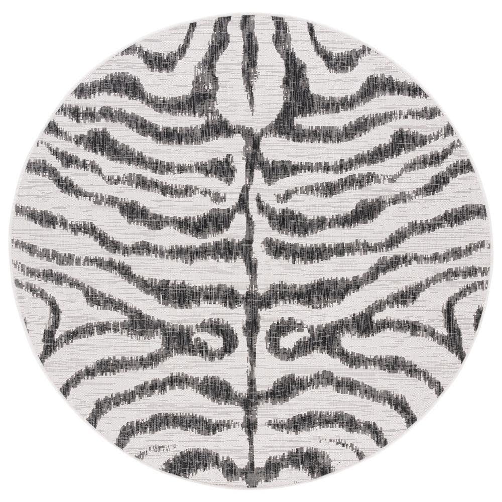 SAFAVIEH Courtyard Ivory/Black 7 ft. Round Zebra Indoor