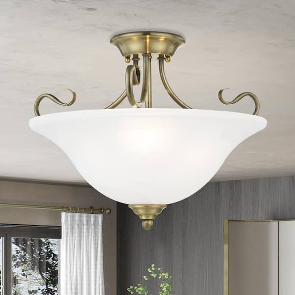 AVIANCE LIGHTING Garrett 3 Light Antique Brass Semi Flush Mount