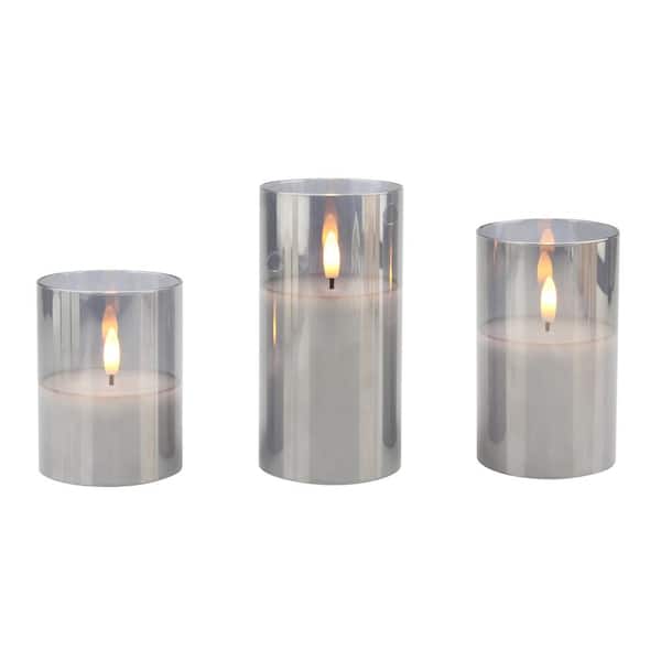 Stonebriar Collection Assorted Size Real Wax Flameless LED Candles in Silver Glass Hurricane Candle Holders (Set of 3)