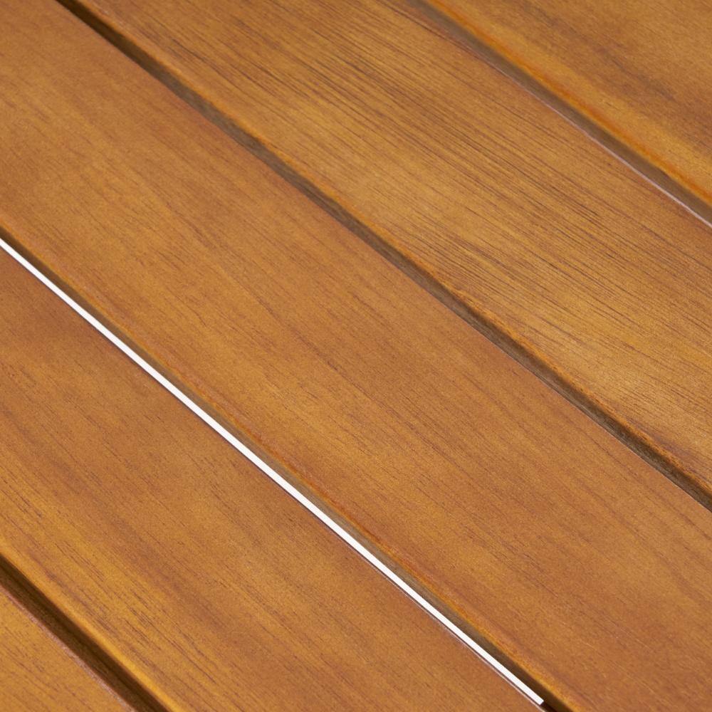 Close-up view of the slatted acacia wood tabletop with a teak finish.