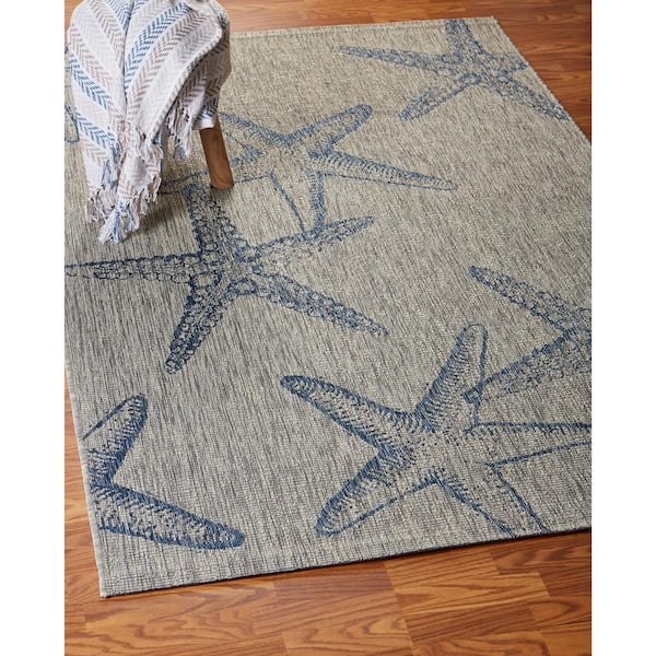 https://images.thdstatic.com/productImages/9782fd9e-6e8c-4925-8524-9ef07005f73f/svn/gray-navy-blue-lr-home-outdoor-rugs-0649a8984d9348-44_600.jpg