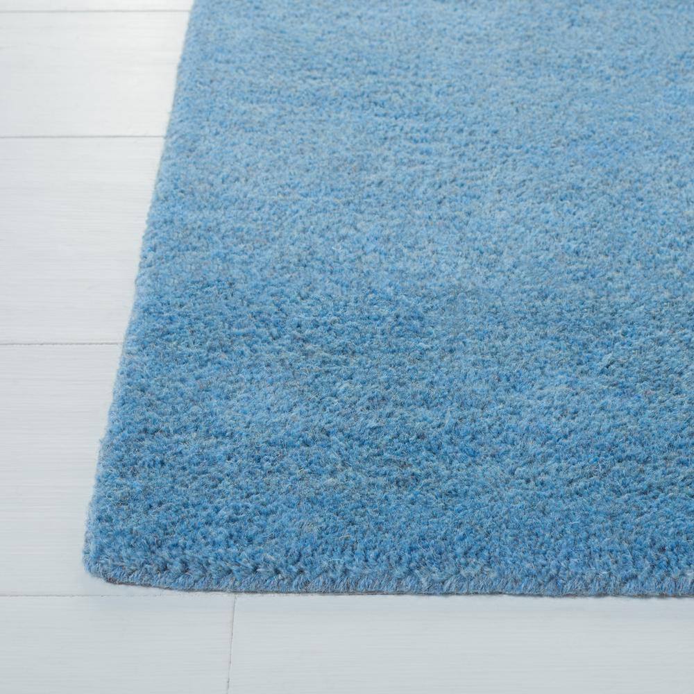 Handmade Coastal Blue Solid Wool Rectangular Accent Rug