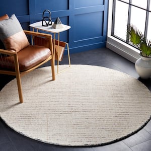 Abstract Ivory/Blue 6 ft. x 6 ft. Speckled Round Area Rug