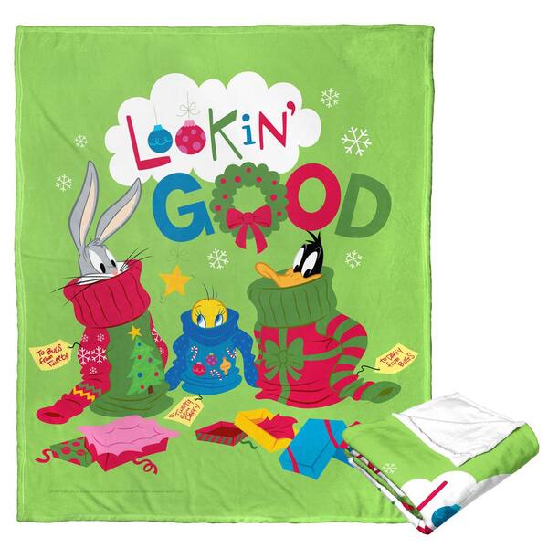 THE NORTHWEST GROUP Warner Bros. Looney Tunes Silk Touch Multi-Colored Throw Blanket Christmas Drip