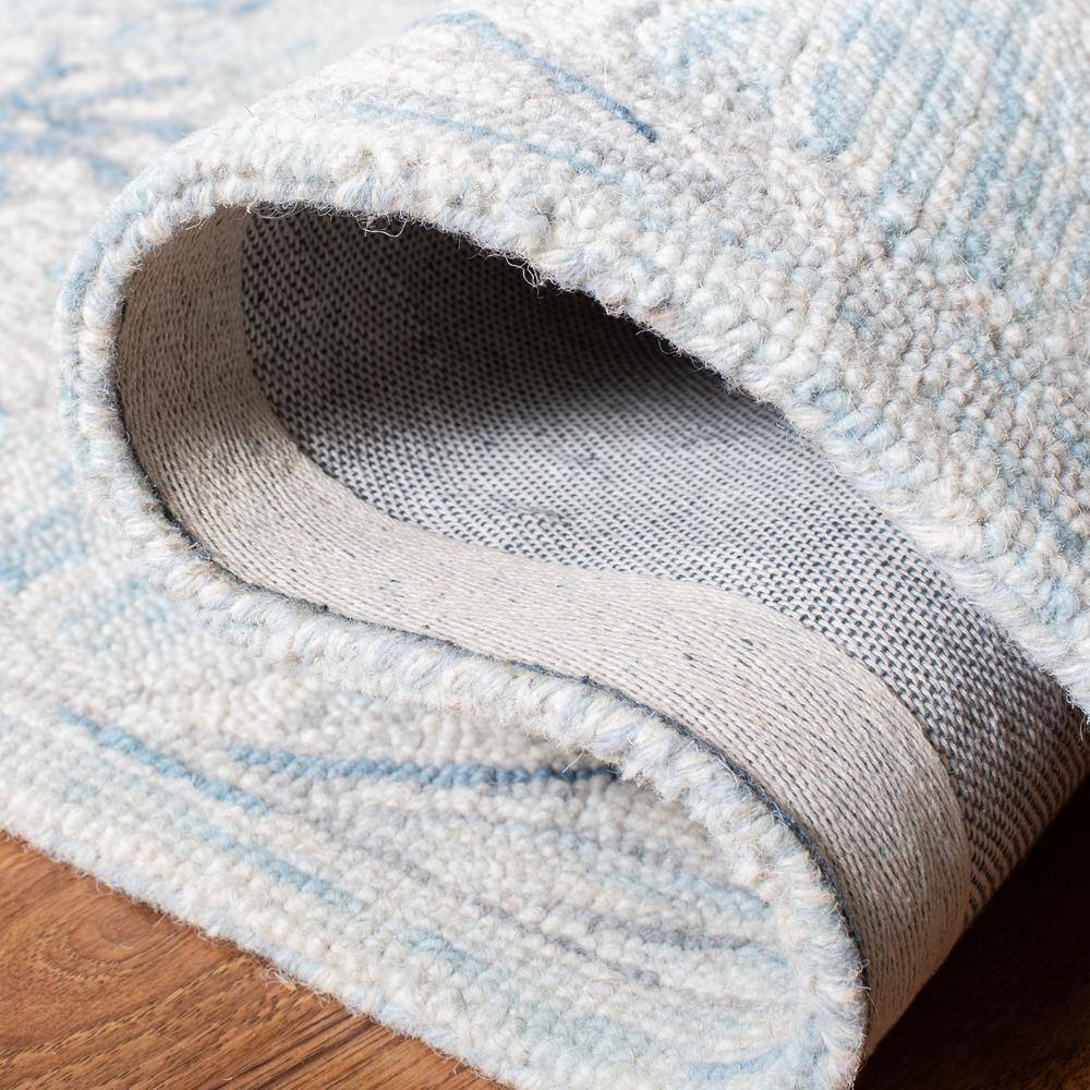 Elysian Bliss Light Blue/Ivory Hand-Tufted Wool Round Rug