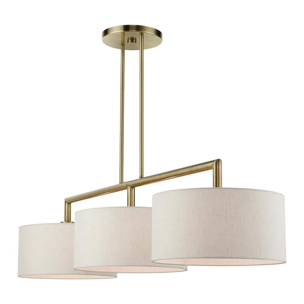 Meridian Antique Brass 3-Light Linear Chandelier with Oatmeal Shades