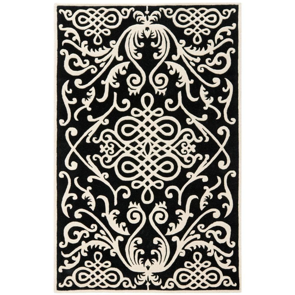 Handmade Black and Ivory Tufted Wool Area Rug, 8'3" x 11'