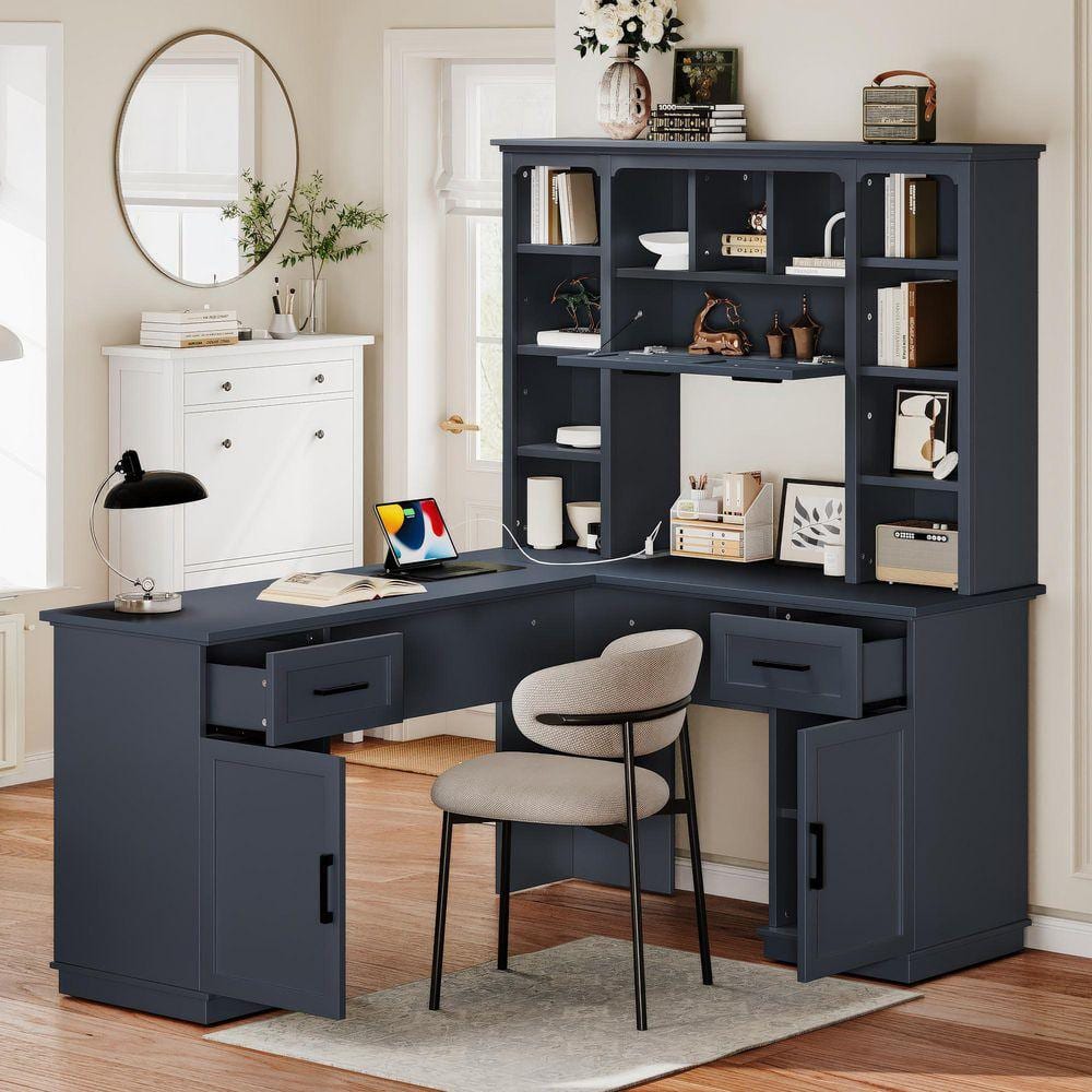 Antique blue L-shaped computer desk with hutch and open drawers in a room setting.