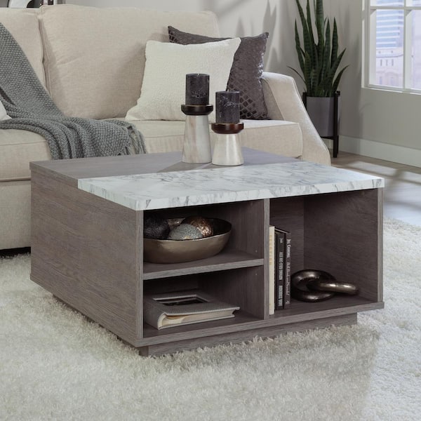 https://images.thdstatic.com/productImages/981d766f-e88e-44ca-b775-26707b8915a5/svn/ashen-oak-sauder-coffee-tables-433861-31_600.jpg