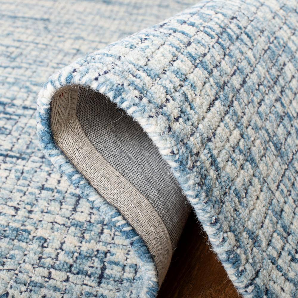 Ivory and Navy Abstract Wool Handmade Area Rug