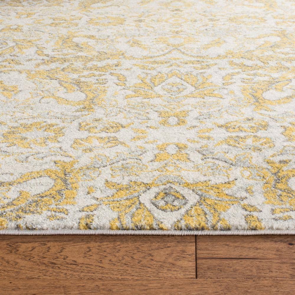 Ivory Gold Elegance 2'2" x 4' Reversible Synthetic Area Rug