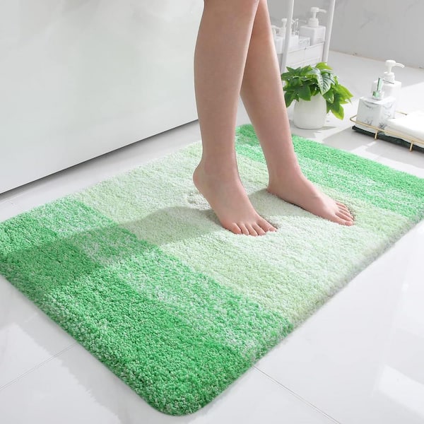 https://images.thdstatic.com/productImages/9824d074-4f88-48fd-b318-01cb238bbb24/svn/green-afoxsos-bathroom-rugs-bath-mats-snph004in258-64_600.jpg