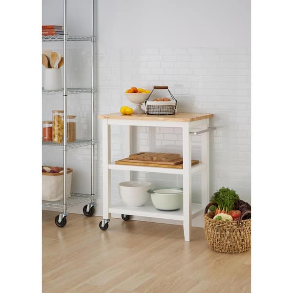 https://images.thdstatic.com/productImages/9833e71a-e57b-4dbe-b96c-111d84efe12a/svn/white-trinity-kitchen-carts-tbflwh-1402-31_600.jpg