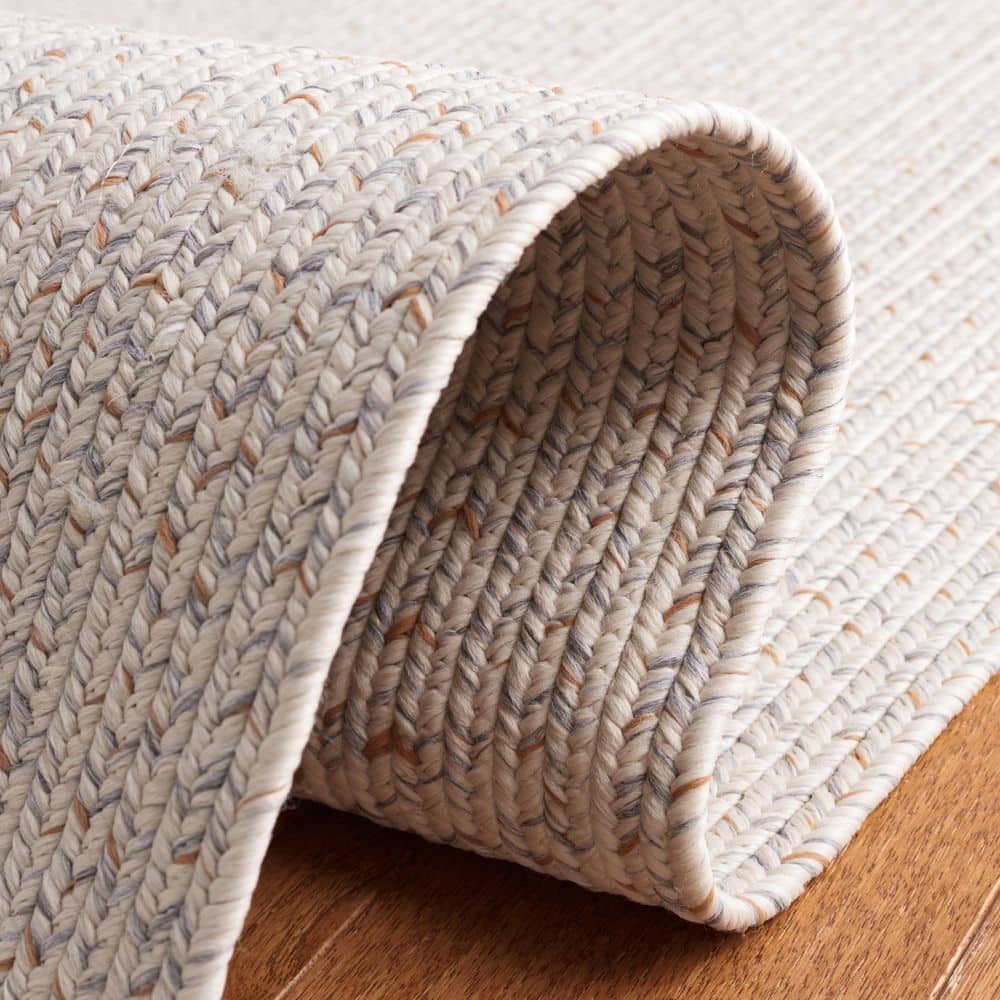 https://images.thdstatic.com/productImages/985729ca-e139-4370-b5ed-09417054358e/svn/ivory-light-gray-safavieh-area-rugs-bra201a-8ov-1f_1000.jpg