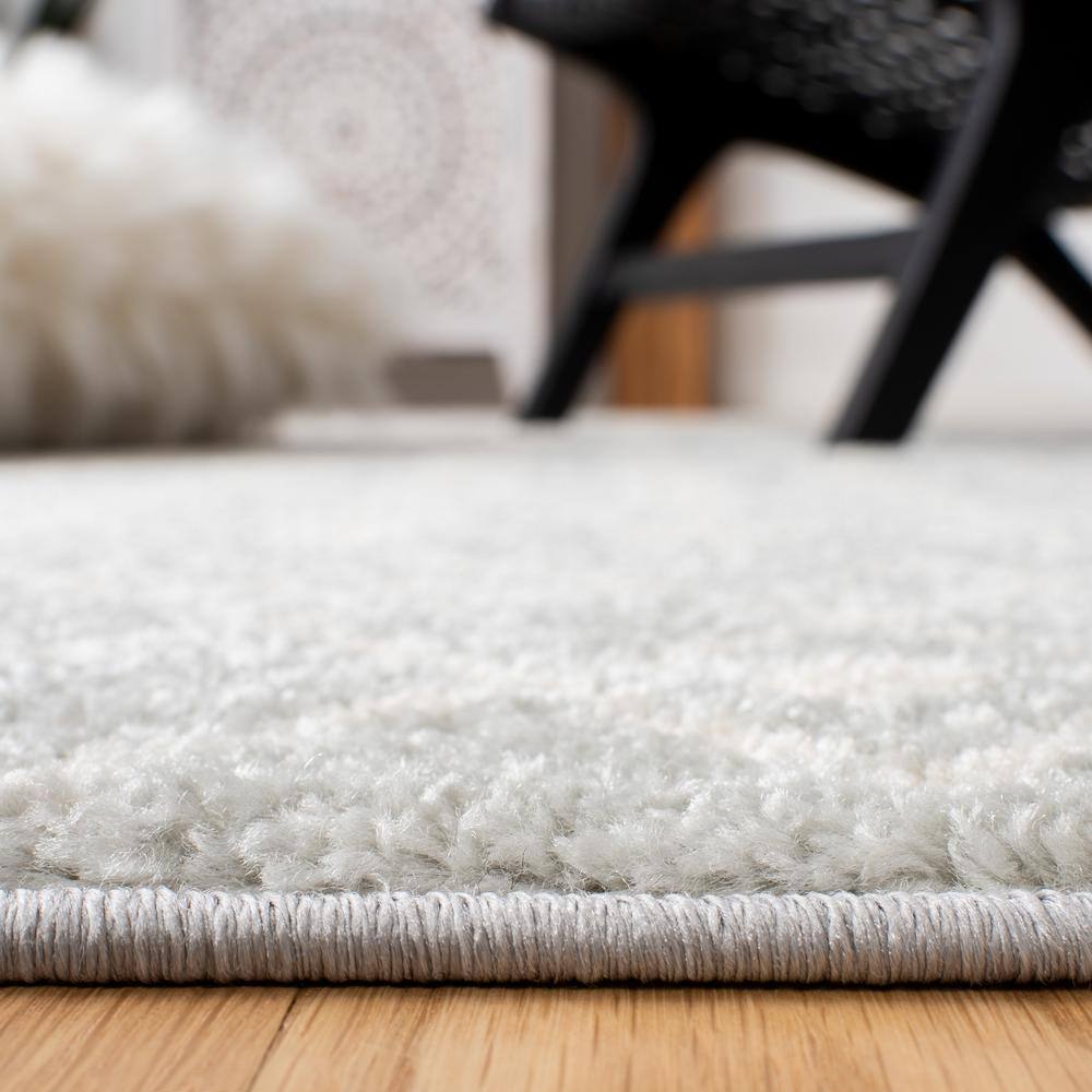 Ivory and Light Grey Wool Synthetic 9' x 12' Rectangular Area Rug