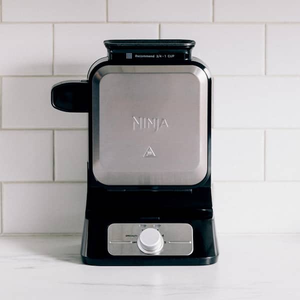 https://images.thdstatic.com/productImages/985b2417-7874-4fc2-b610-52d9f6878bb8/svn/black-stainless-steel-ninja-waffle-makers-bw1001-31_600.jpg