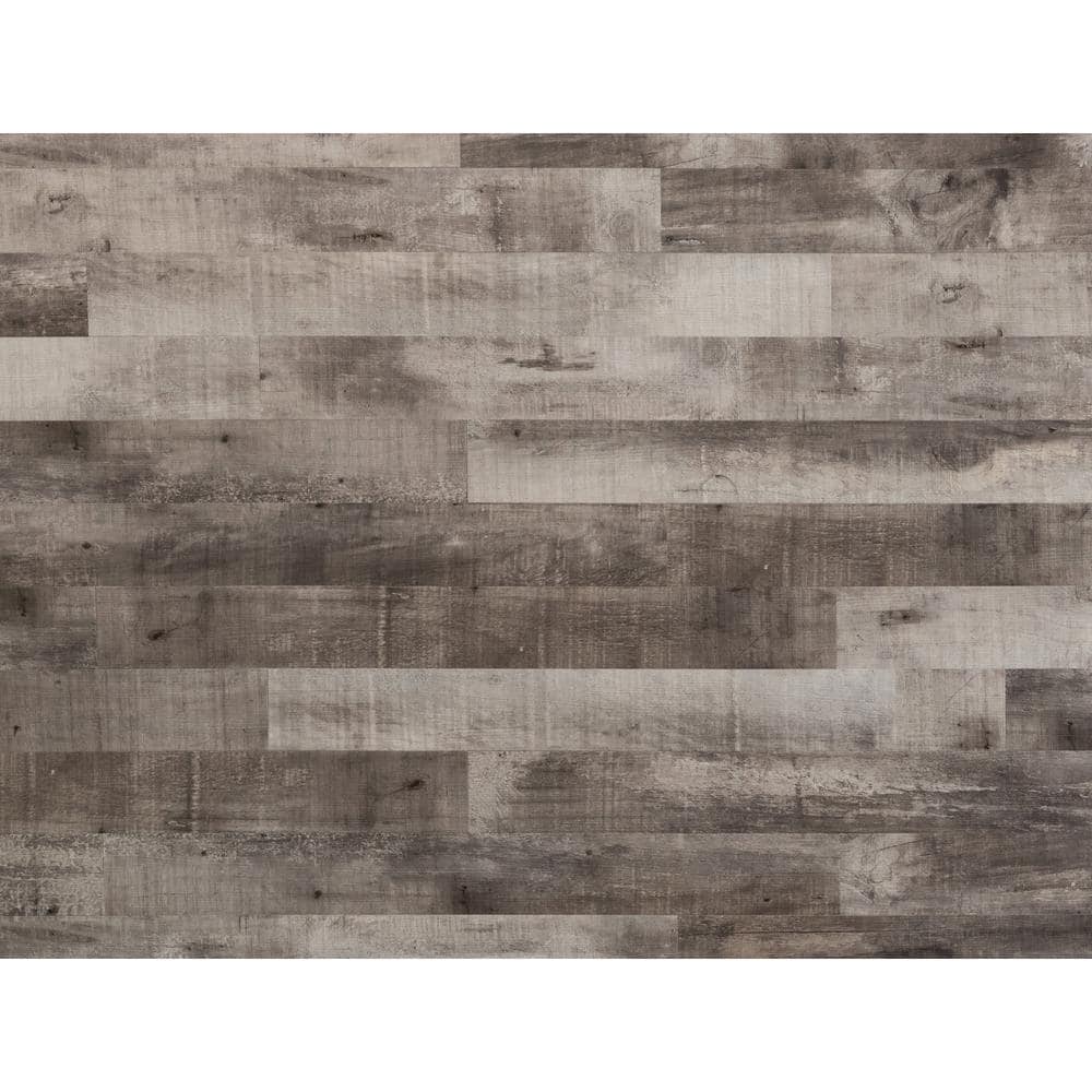 https://images.thdstatic.com/productImages/987c54da-57c5-469e-bc3c-cabf6a62fbc0/svn/driftwood-nance-carpet-and-rug-vinyl-plank-flooring-21033-64_1000.jpg