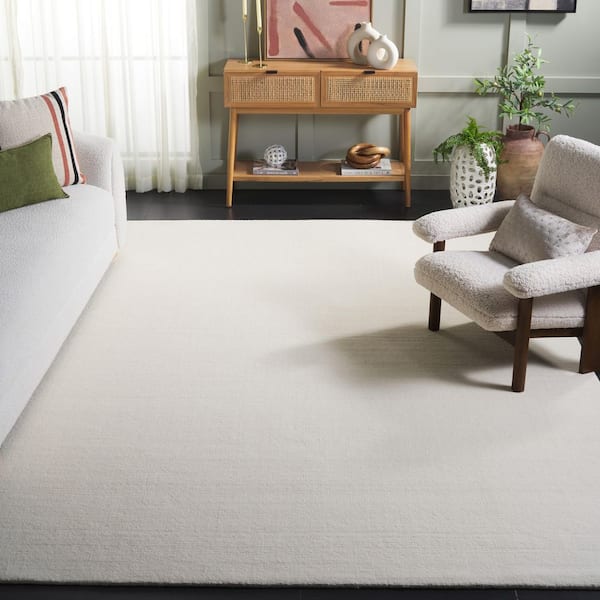 Mirage 6 ft. x 9 ft. Ivory Solid Color Area Rug