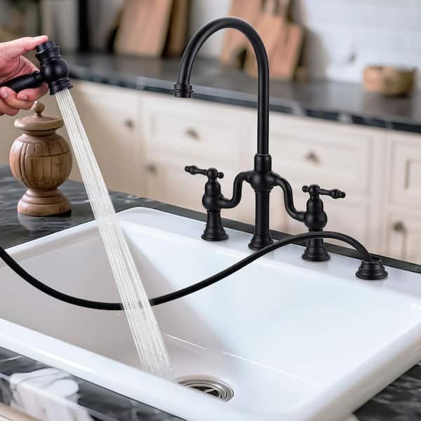 Double Handle High Arc Brass Bridge Kitchen Faucet with Side Sprayer in Matte Black