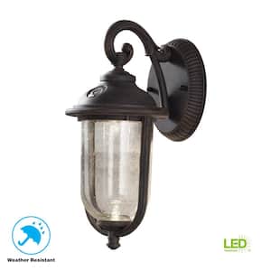Perdido 13.25 in. Rustic Bronze Dusk to Dawn Integrated LED 6 in. Outdoor Wall Lantern Sconce