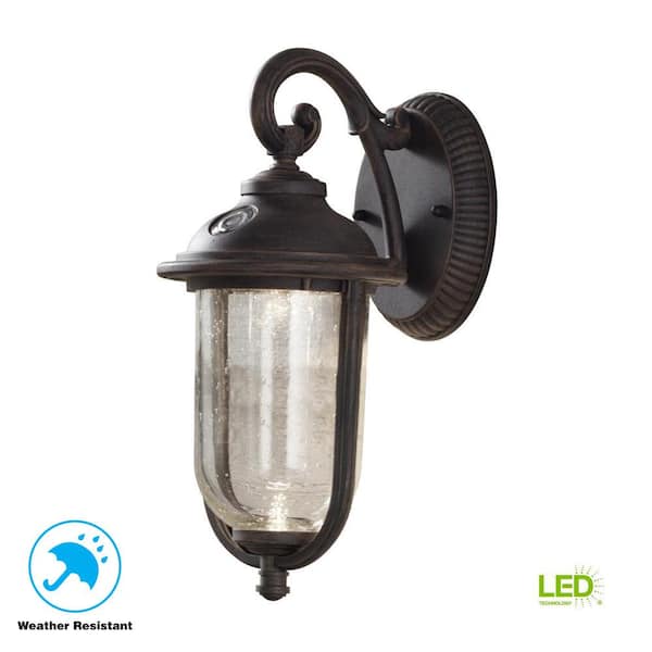 Hampton Bay Perdido 13.25 in. Rustic Bronze Dusk to Dawn Integrated LED 6 in. Outdoor Wall Lantern Sconce