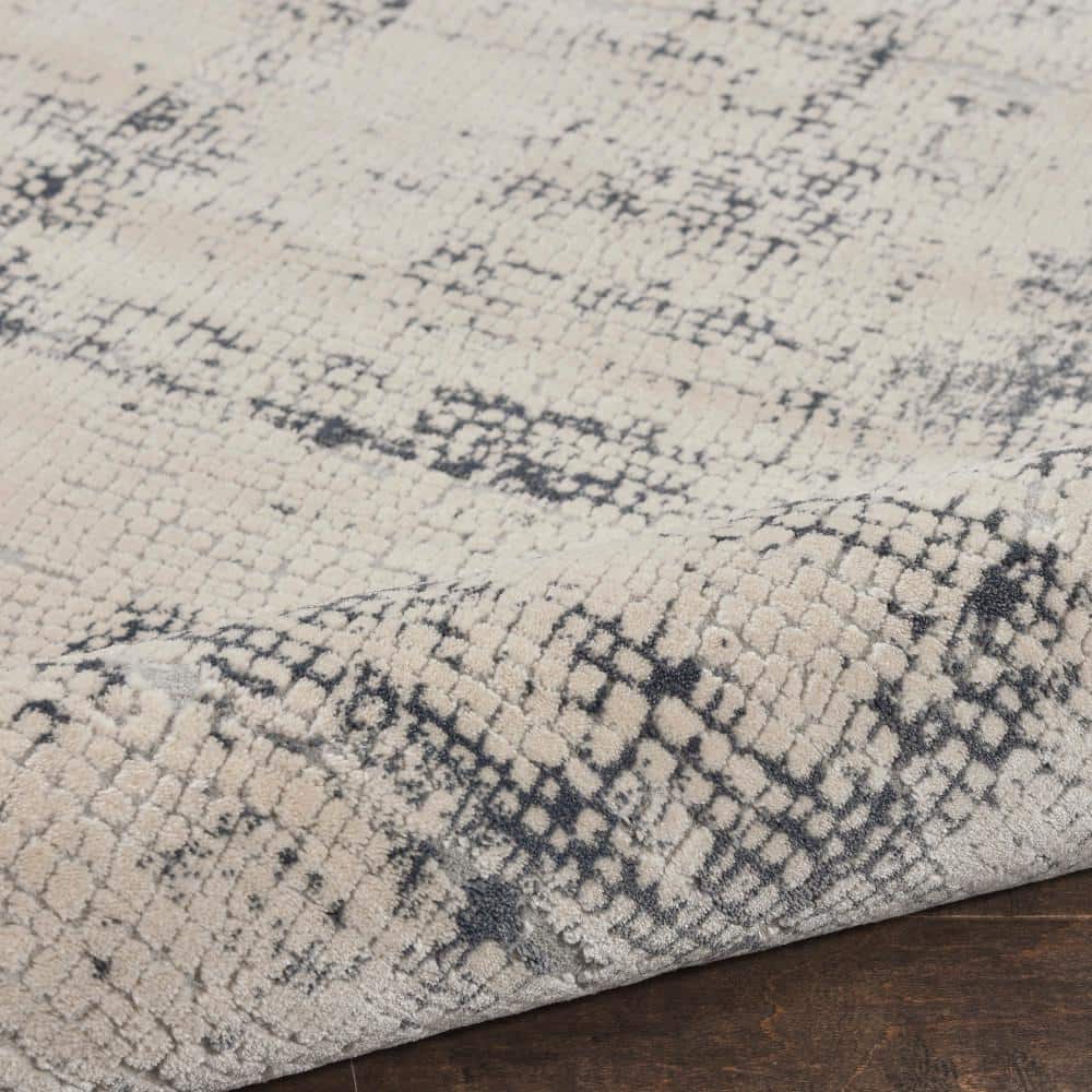 Modern Abstract Ivory & Blue Synthetic Area Rug 7'10" x 10'6"