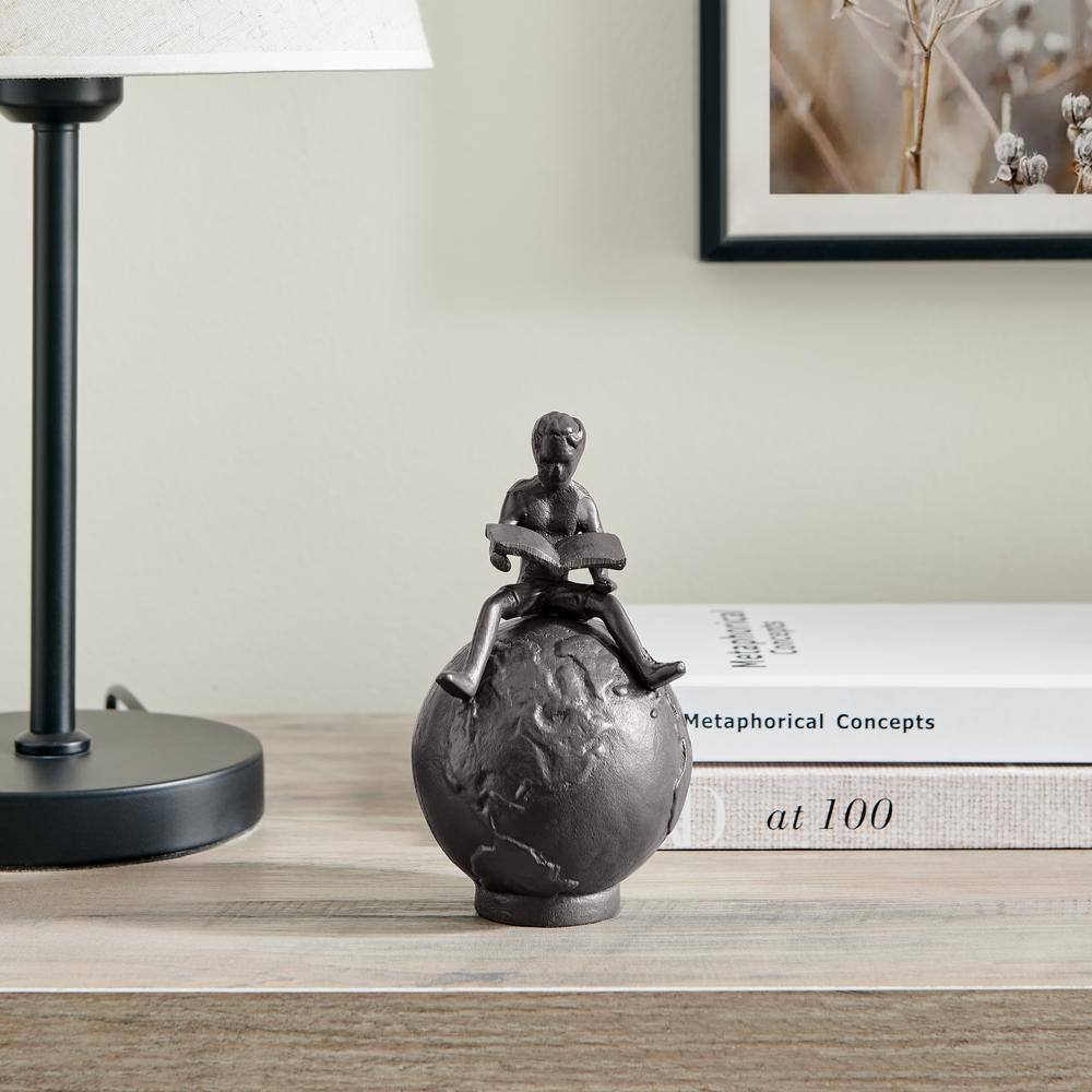 Bronze Cast Iron Boy Reading on Globe Tabletop Sculpture