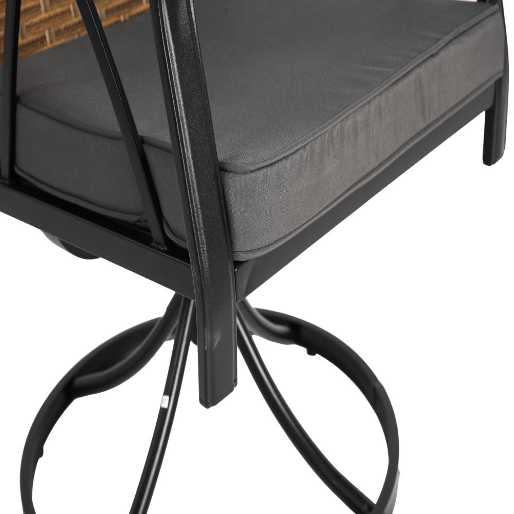Close-up of a dark gray seat cushion on a black metal chair frame.