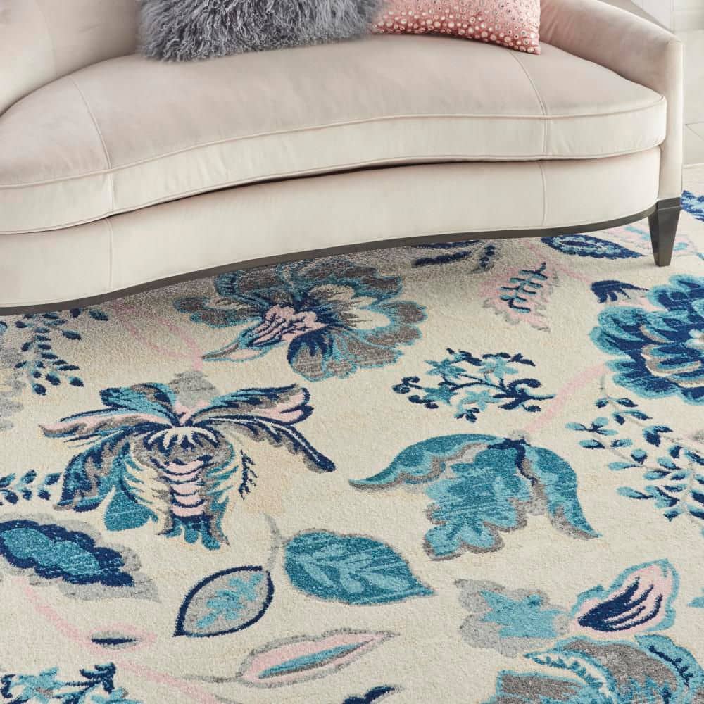Elegant Ivory and Light Blue Floral 8' x 10' Synthetic Area Rug
