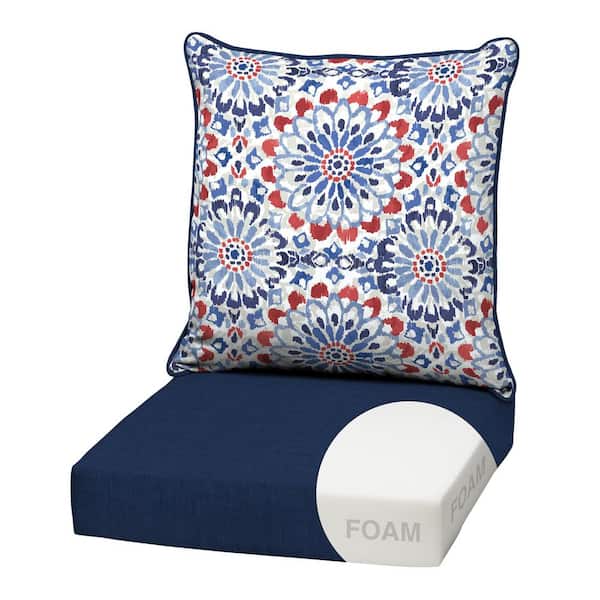 Square cushion with blue and white floral pattern on a blue base.