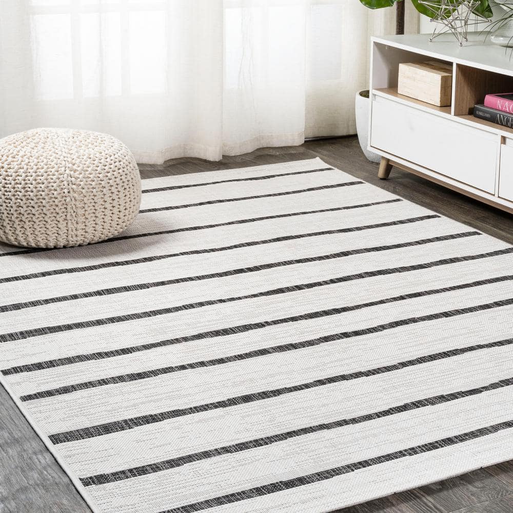Ivory and Black Striped Synthetic 4' x 6' Indoor/Outdoor Rug