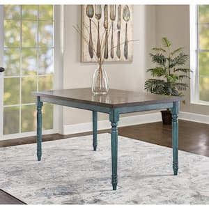 Willie Teal Blue wood top 59.06 in. W 4 legged Dining Table 6 person seating capacity