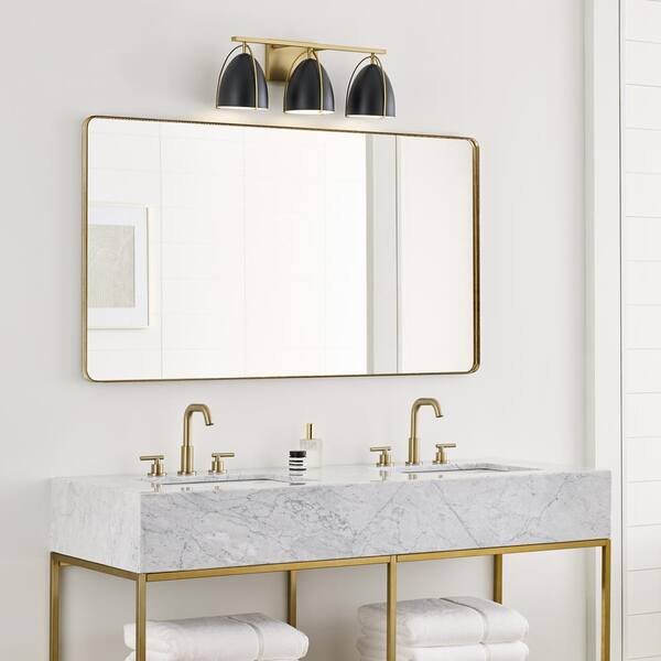 Generation Lighting - Norman 24.25 in. H 3-Light Satin Brass Vanity Light with Midnight Black Steel Shades