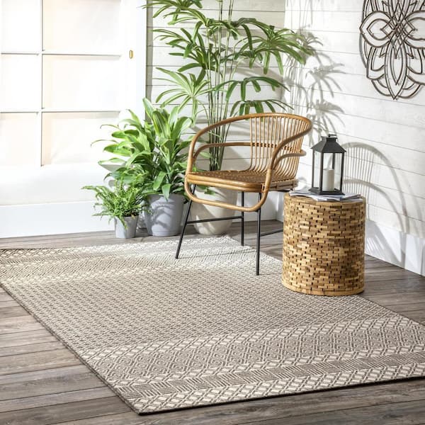 https://images.thdstatic.com/productImages/991429df-4bdc-4c81-befa-5d3c99b05791/svn/light-gray-nuloom-outdoor-rugs-owfr01b-6709-e1_600.jpg