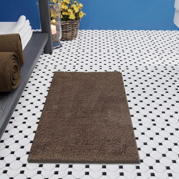 https://images.thdstatic.com/productImages/99232944-af24-4add-9d6d-1341cf47be8a/svn/mocha-brown-resort-collection-bathroom-rugs-bath-mats-ymb001939-4f_600.jpg
