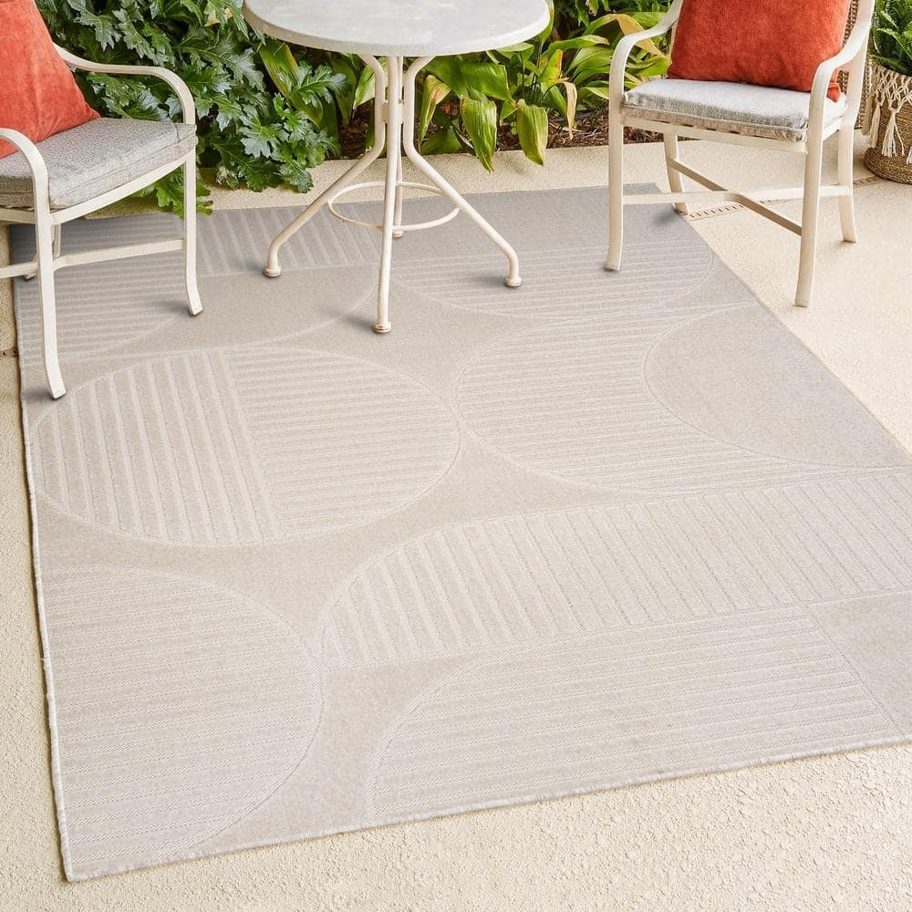 Ivory and Cream Geometric High-Low 8' x 10' Area Rug