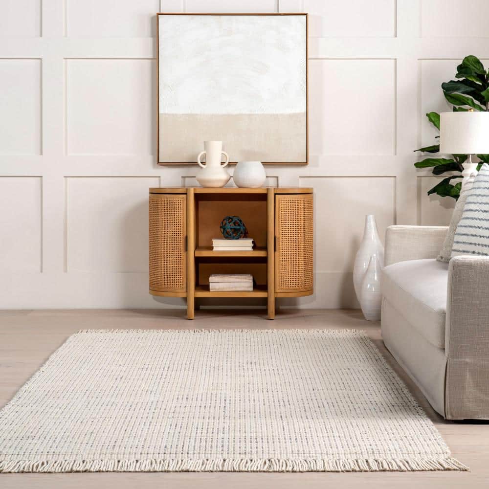 Handmade Ivory Wool Rectangular Area Rug with Fringe