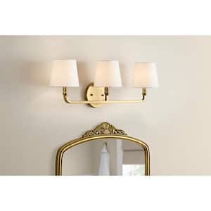 Canterwood 24.88 in. 3-Light Brass Bathroom Vanity Light Fixture with Tapered Fabric Shades