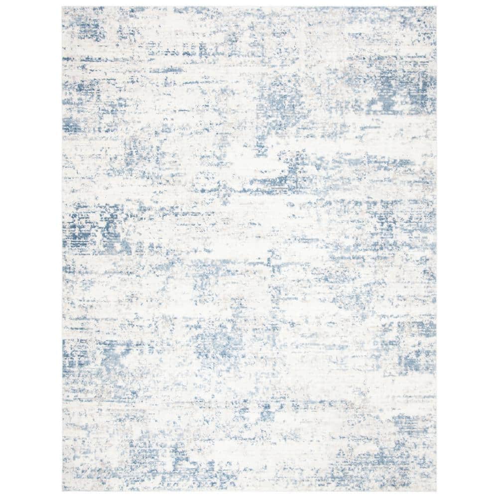 Ivory and Blue Abstract 10' x 14' Synthetic Area Rug