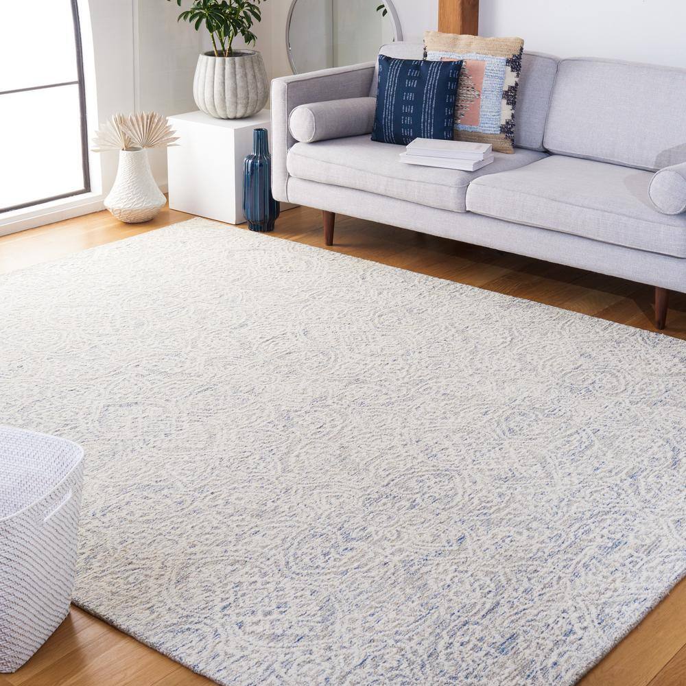 Light Blue and Ivory Floral Wool 8' x 10' Handmade Tufted Rug