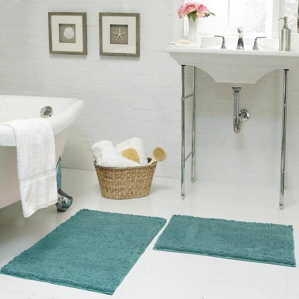 https://images.thdstatic.com/productImages/996973d2-9312-48ce-9d7f-bd530f04651b/svn/marine-resort-collection-bathroom-rugs-bath-mats-ymb001942-fa_600.jpg