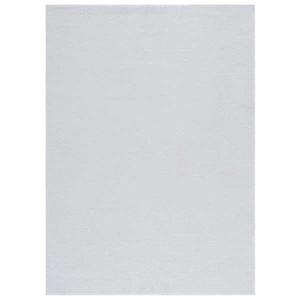 SAFAVIEH Boucle Ivory 5 ft. x 7 ft. Machine Washable Solid Area Rug