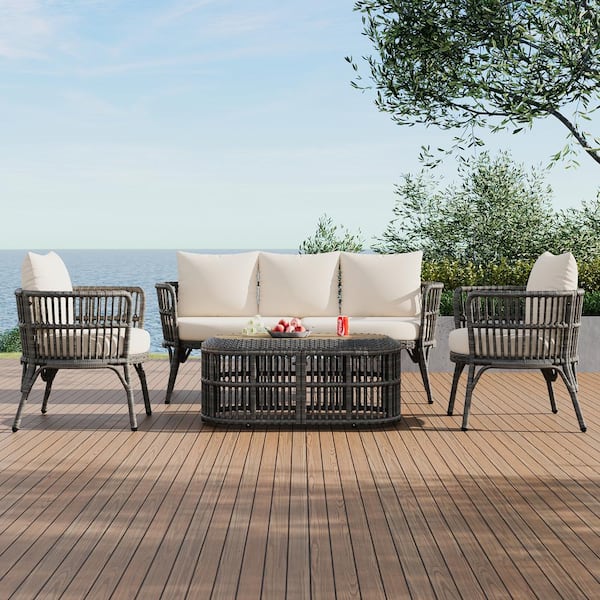 Zeus & Ruta 4-Piece Grey Rattan Wicker Outdoor Conversation Set with Beige Cushions and Coffee Table for Porch, Backyard and Garden