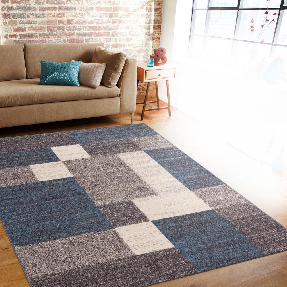 Blue Geometric Tufted Reversible Rectangular 5' x 7' Synthetic Rug