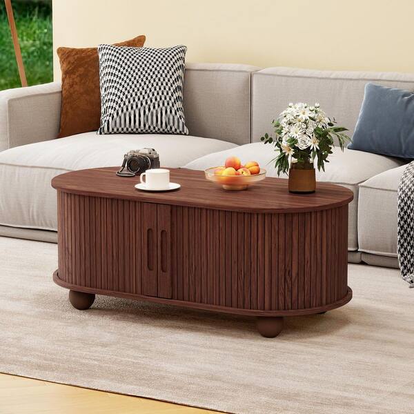 39.38 in. Walnut Brown Oval Wood Coffee Table with Strip Sliding Door