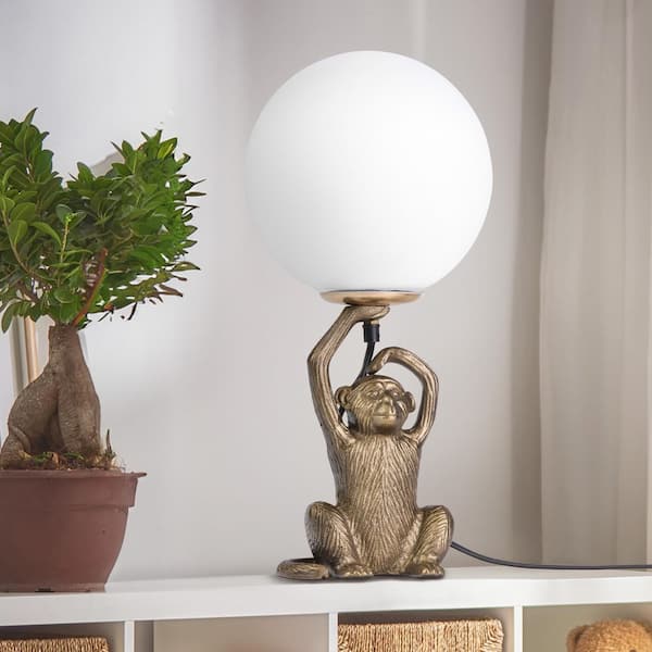 River of Goods Verne 17 in. Gold Monkey Table Lamp with White Blown Glass Globe Shade